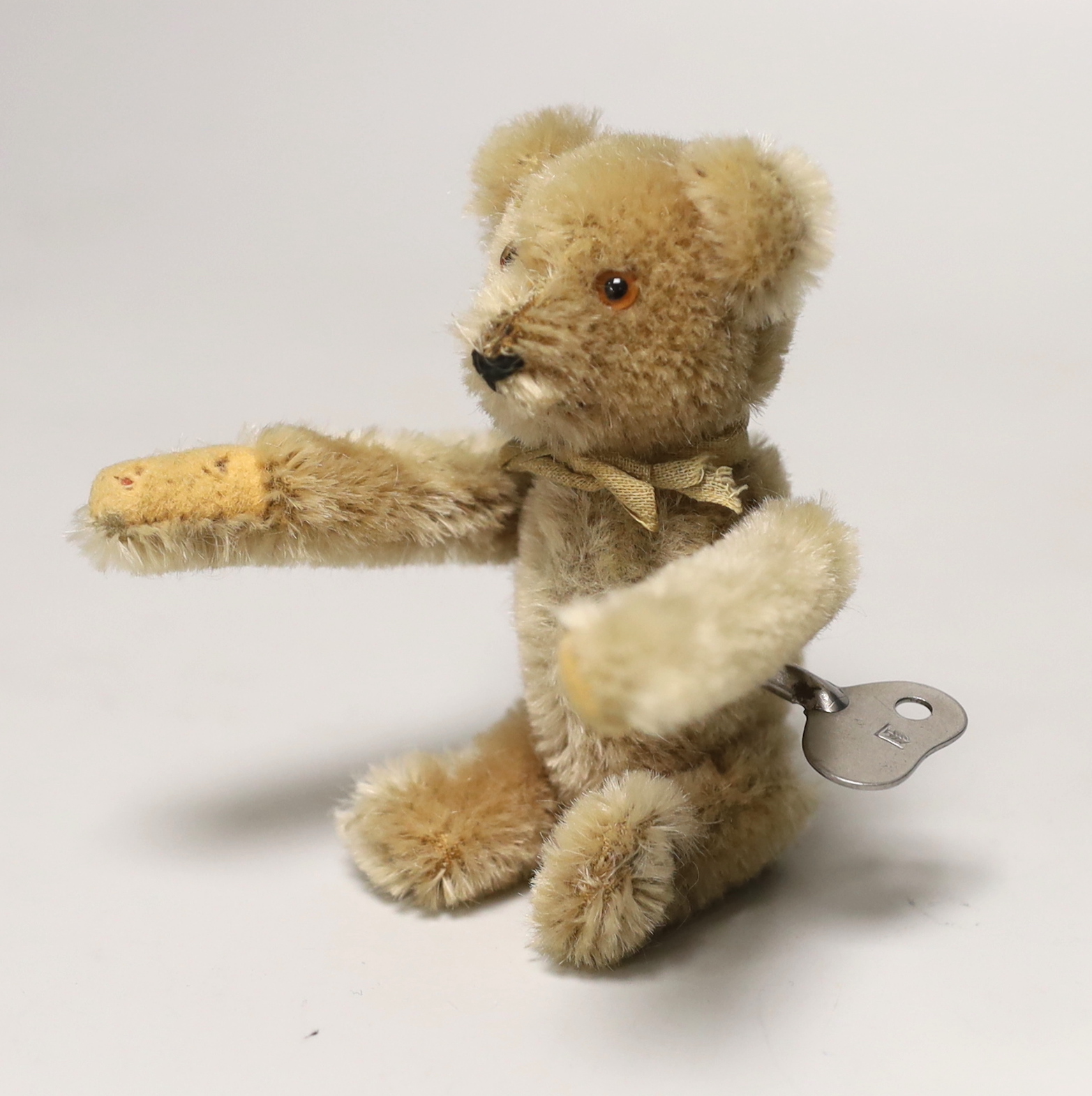 A Schuco tumbling bear with key, c.1950. 5in., excellent condition